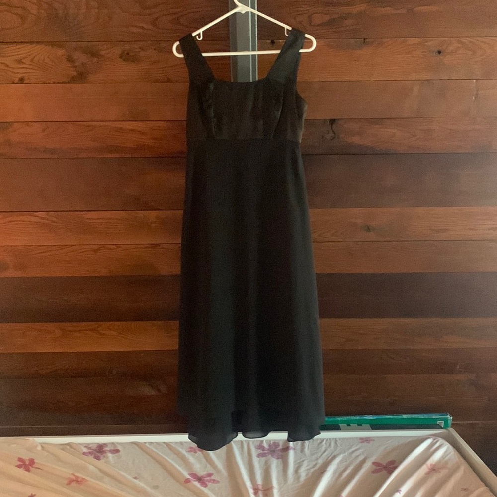 Nice long black dress, size 6. No rips or stains, worn one time